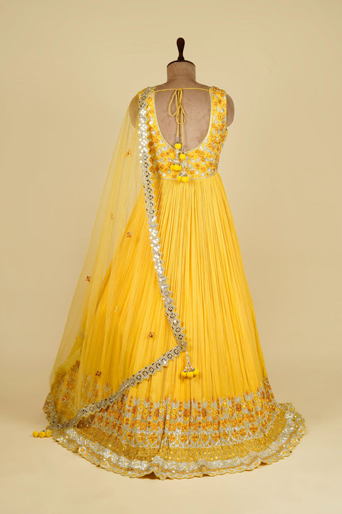 Yellow Anarkali embellished with Mirror, Gottapati and Thread work