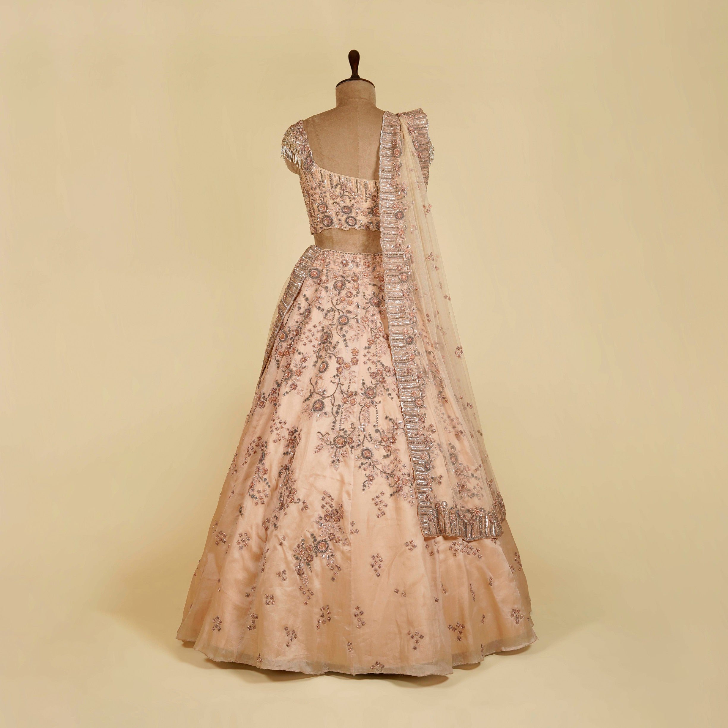 Dusty Peach Lehenga Choli embellished with Sequins, Thread and Cut dana work