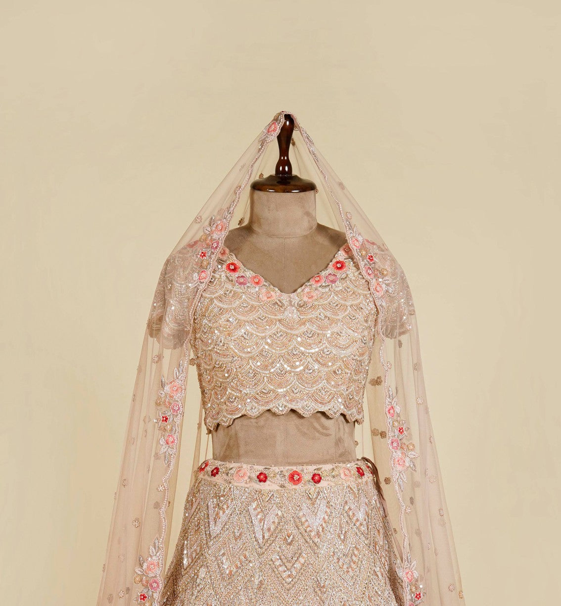 Light Peach Lehenga Choli embellished with Sequins, Thread and Cut dana work