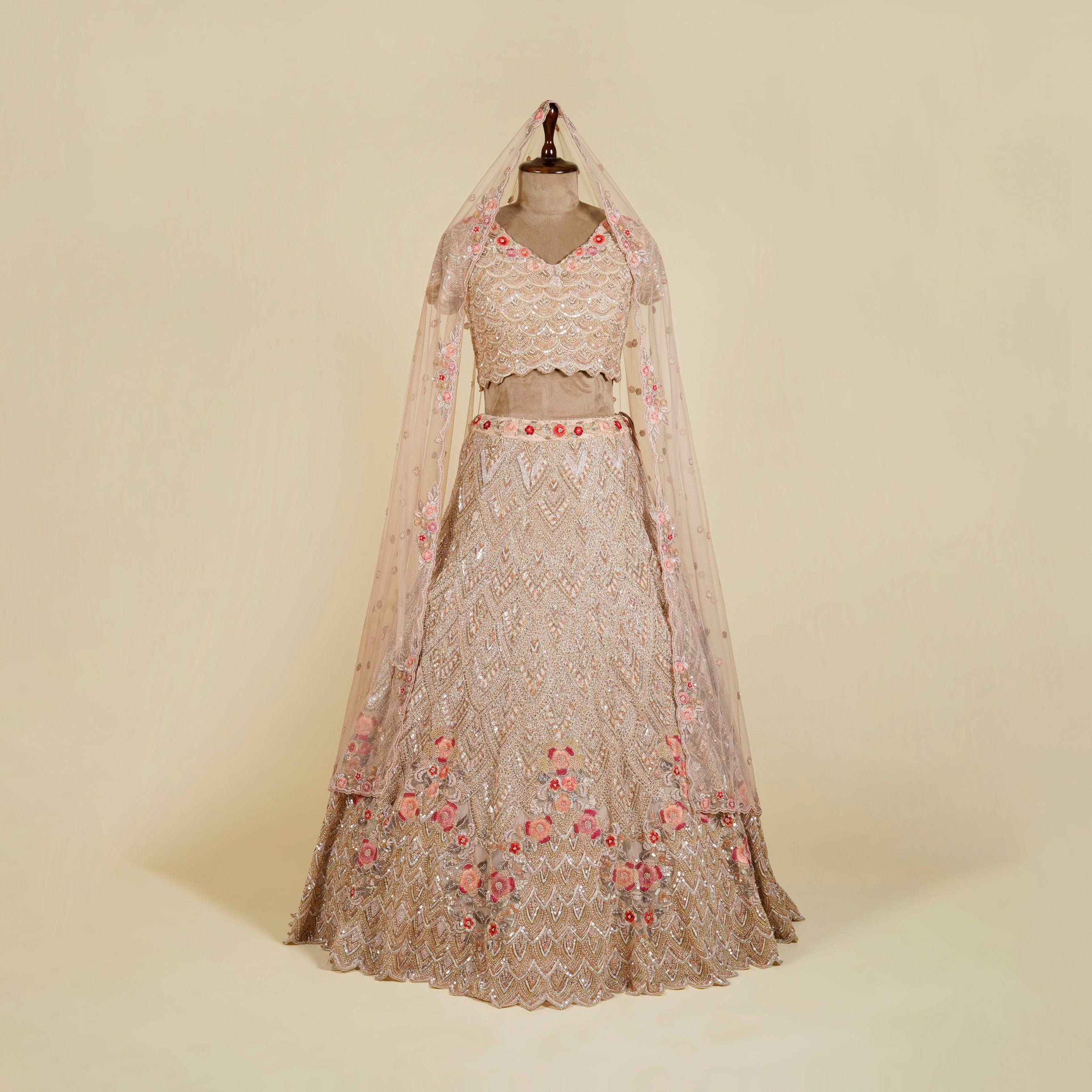 Light Peach Lehenga Choli embellished with Sequins, Thread and Cut dana work