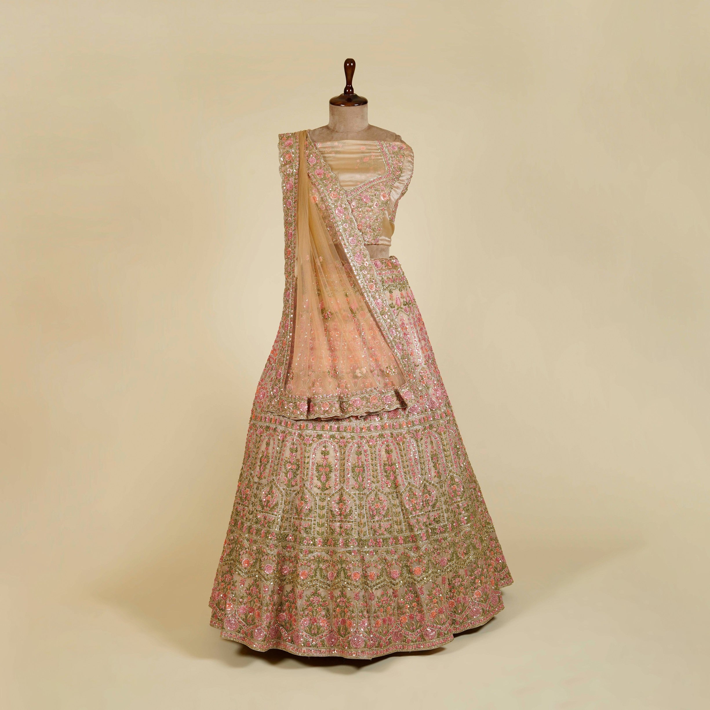 Gold Lehenga Choli embellished with Sequins, Thread and Cut dana work