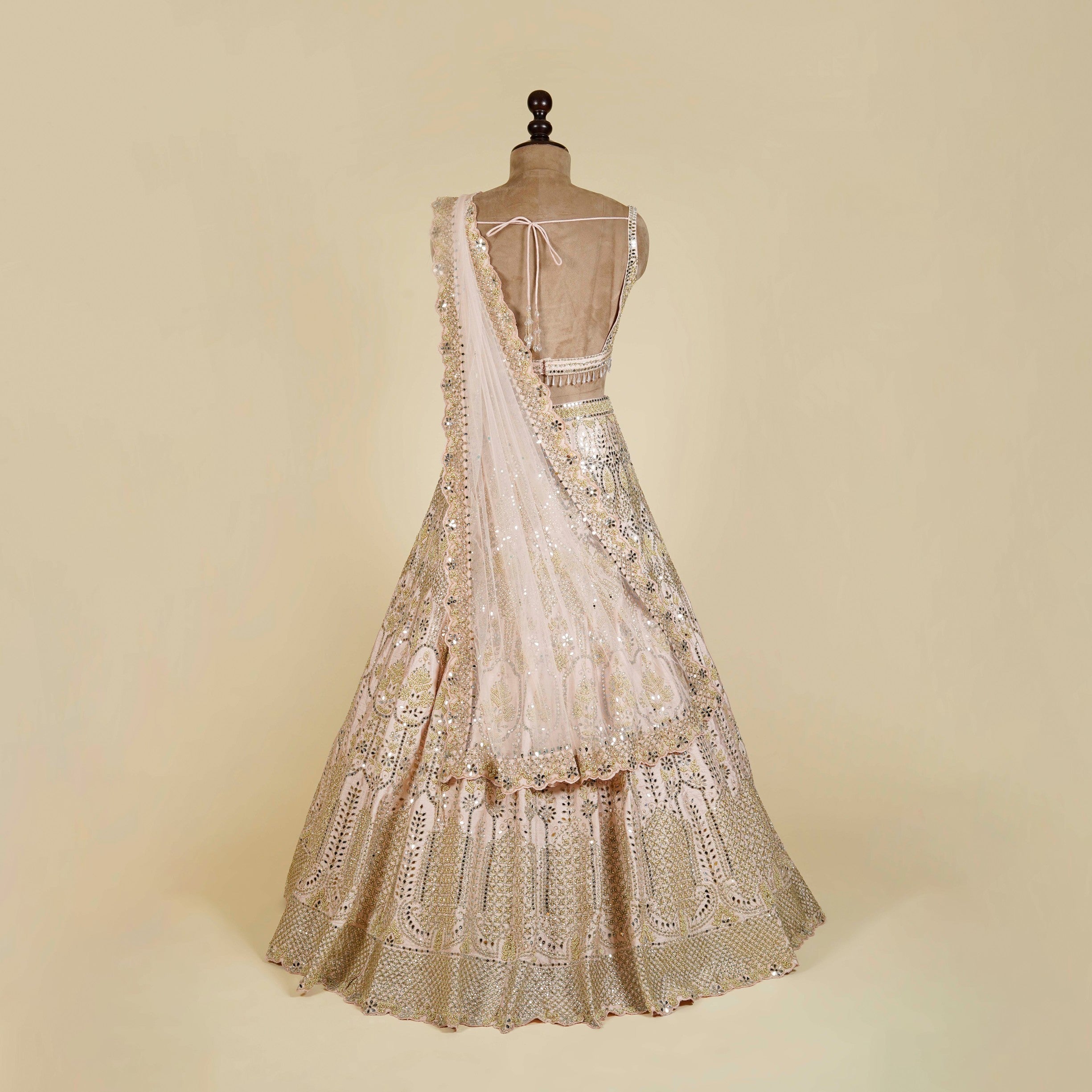 Powder Pink Lehenga Choli embellished with Mirror and Pearl work