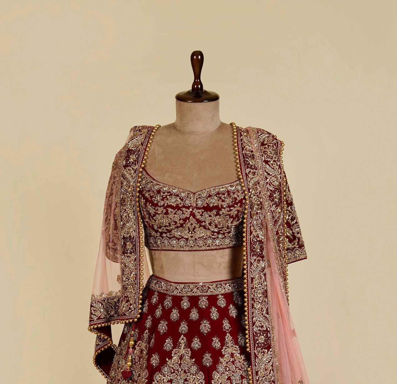 Maroon Lehenga Choli embellished with Dabka, Stone and antique hand work