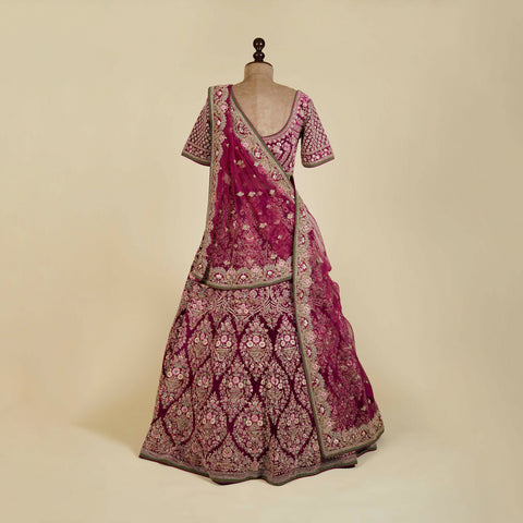 Wine Lehenga Choli embellished with Dabka, Stone and Thread Antique hand work