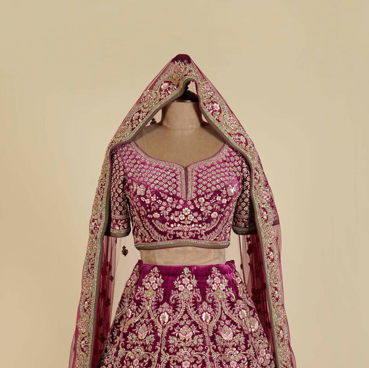 Wine Lehenga Choli embellished with Dabka, Stone and Thread Antique hand work