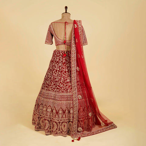 Reddish Maroon Lehenga Choli embellished with Gold Dabka, Stone and hand work