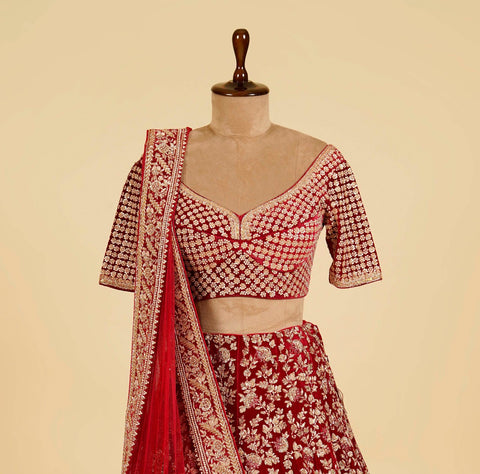 Reddish Maroon Lehenga Choli embellished with Gold Dabka, Stone and hand work