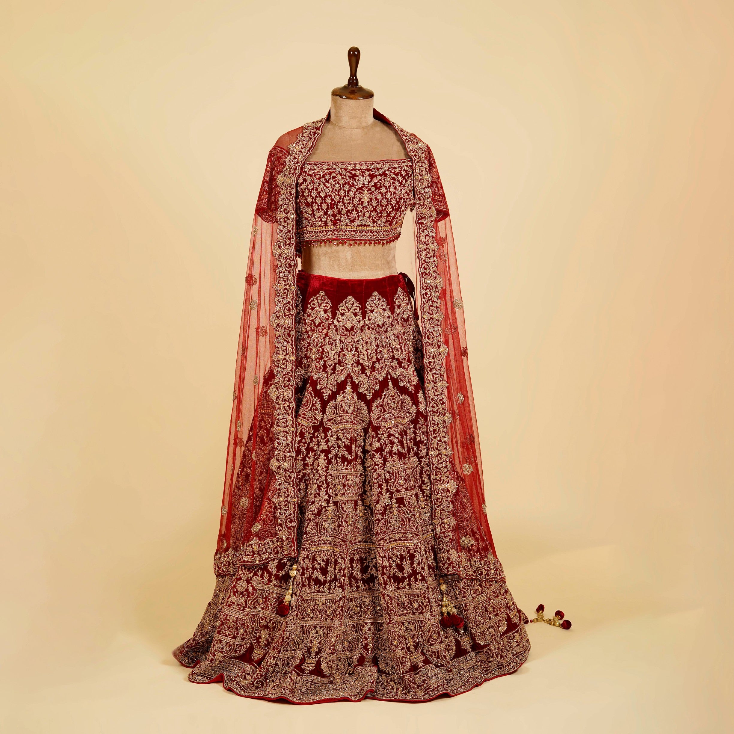 Maroon Lehenga Choli embellished with Dabka, Stone and antique hand work