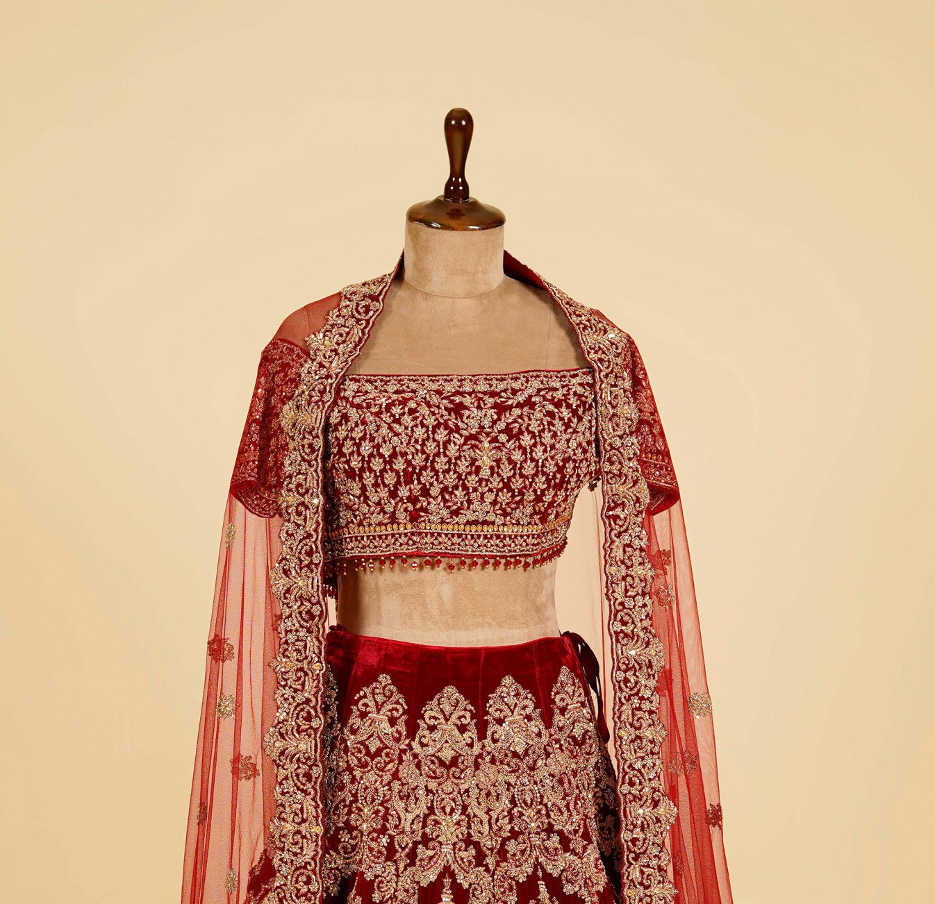 Maroon Lehenga Choli embellished with Dabka, Stone and antique hand work