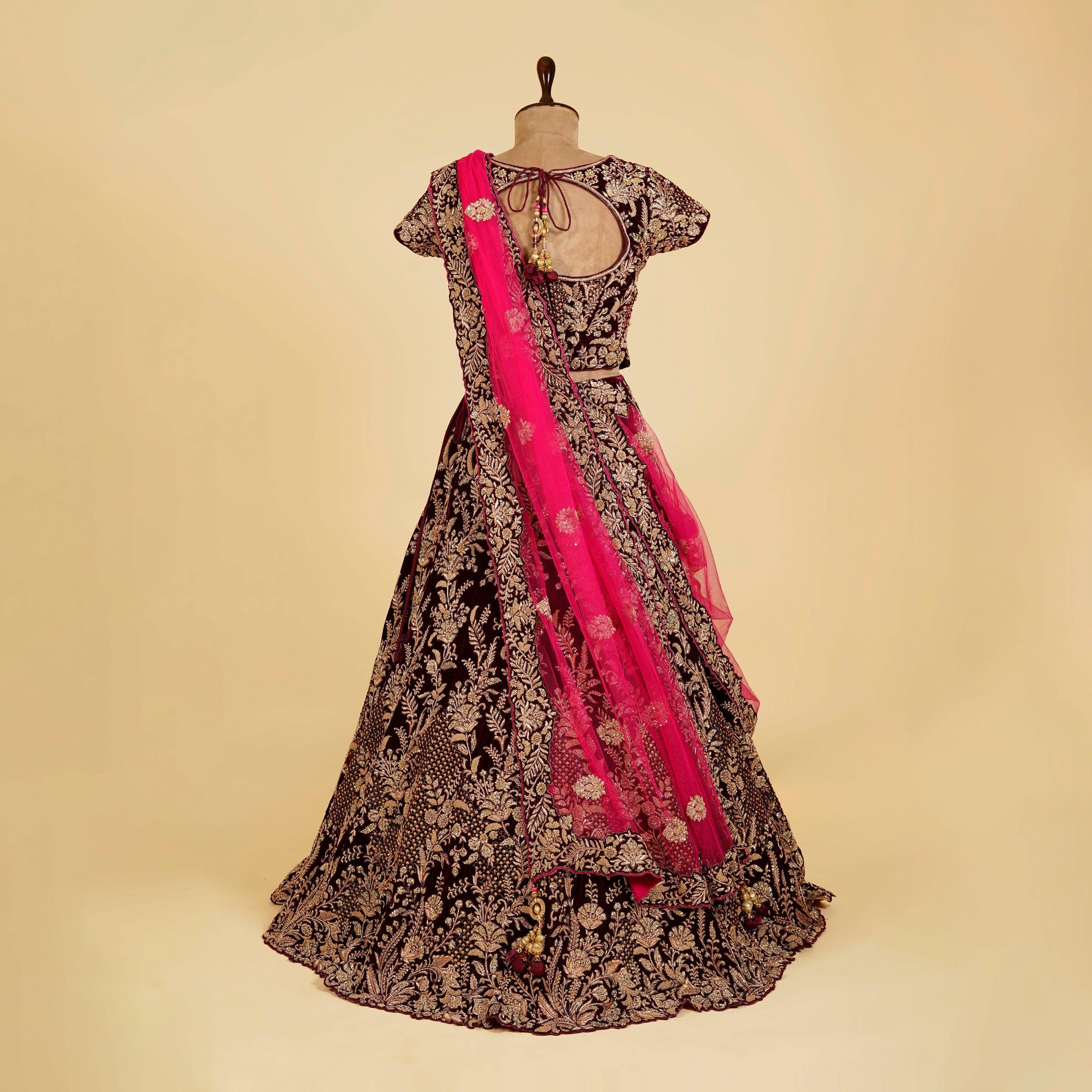 Purple Wine Lehenga Choli embellished with Dabka, Stone and Thread hand work