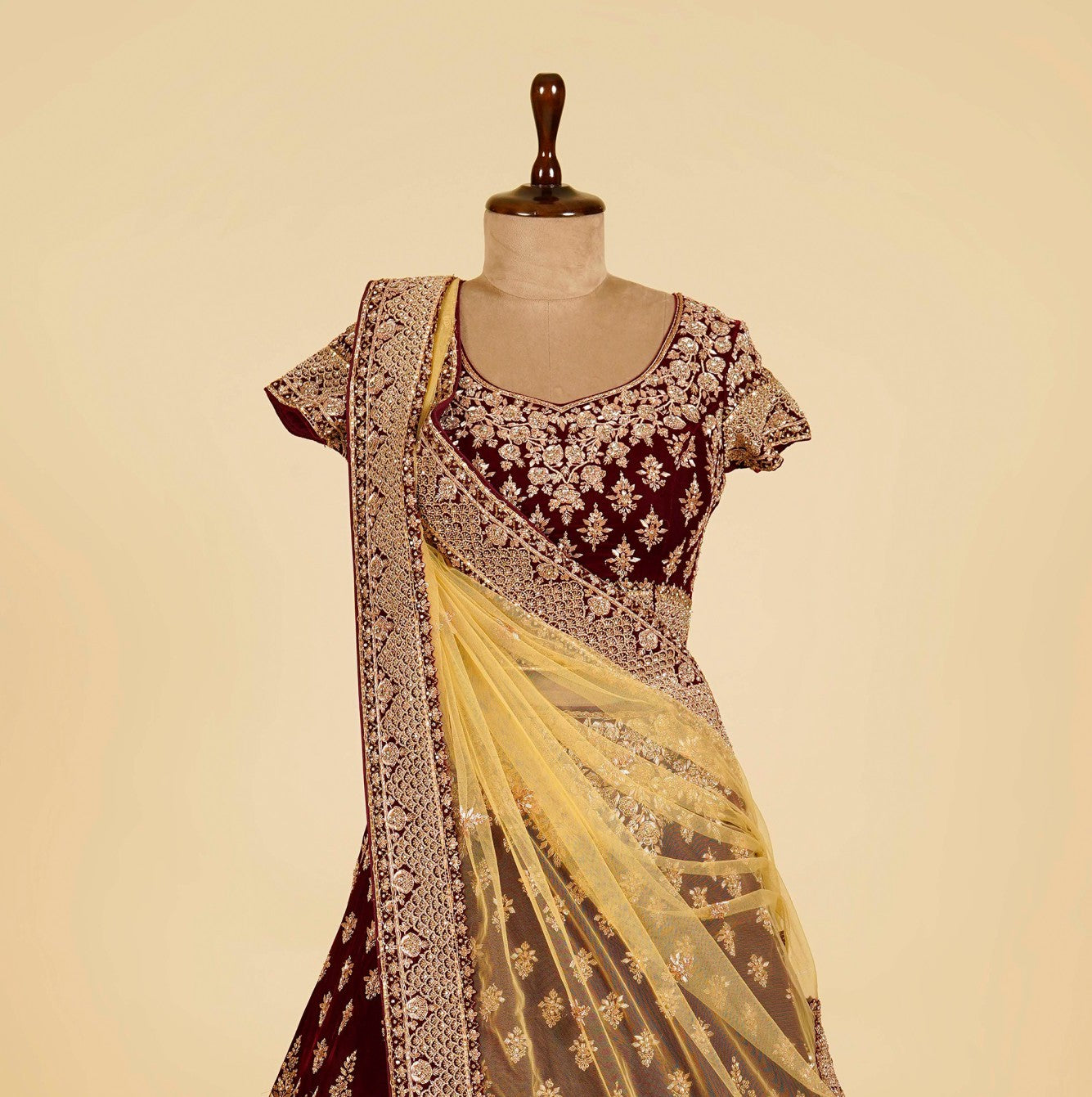 Maroon Wine Lehenga Choli embellished with Dabka, Stone and antique gold hand work