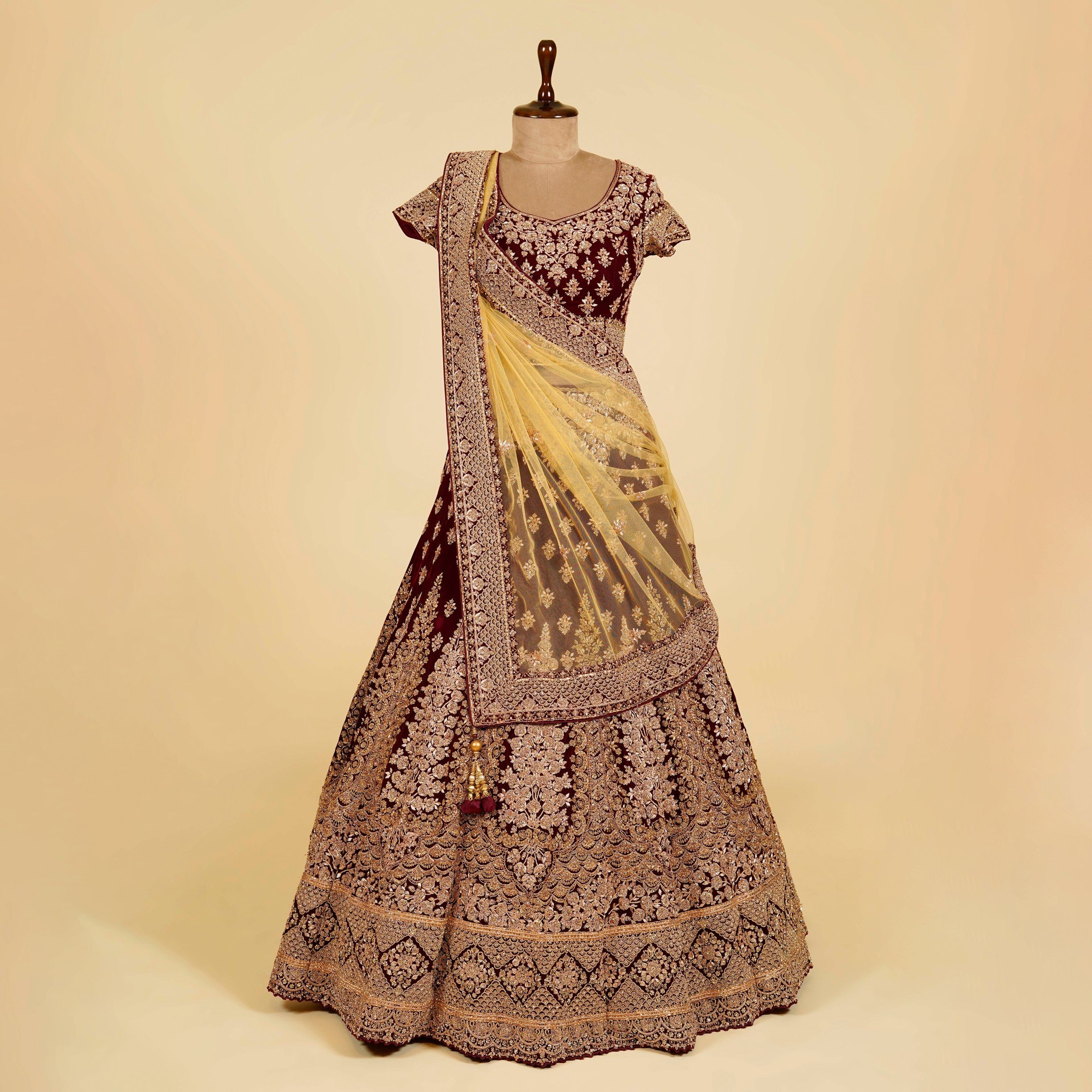 Maroon Wine Lehenga Choli embellished with Dabka, Stone and antique gold hand work