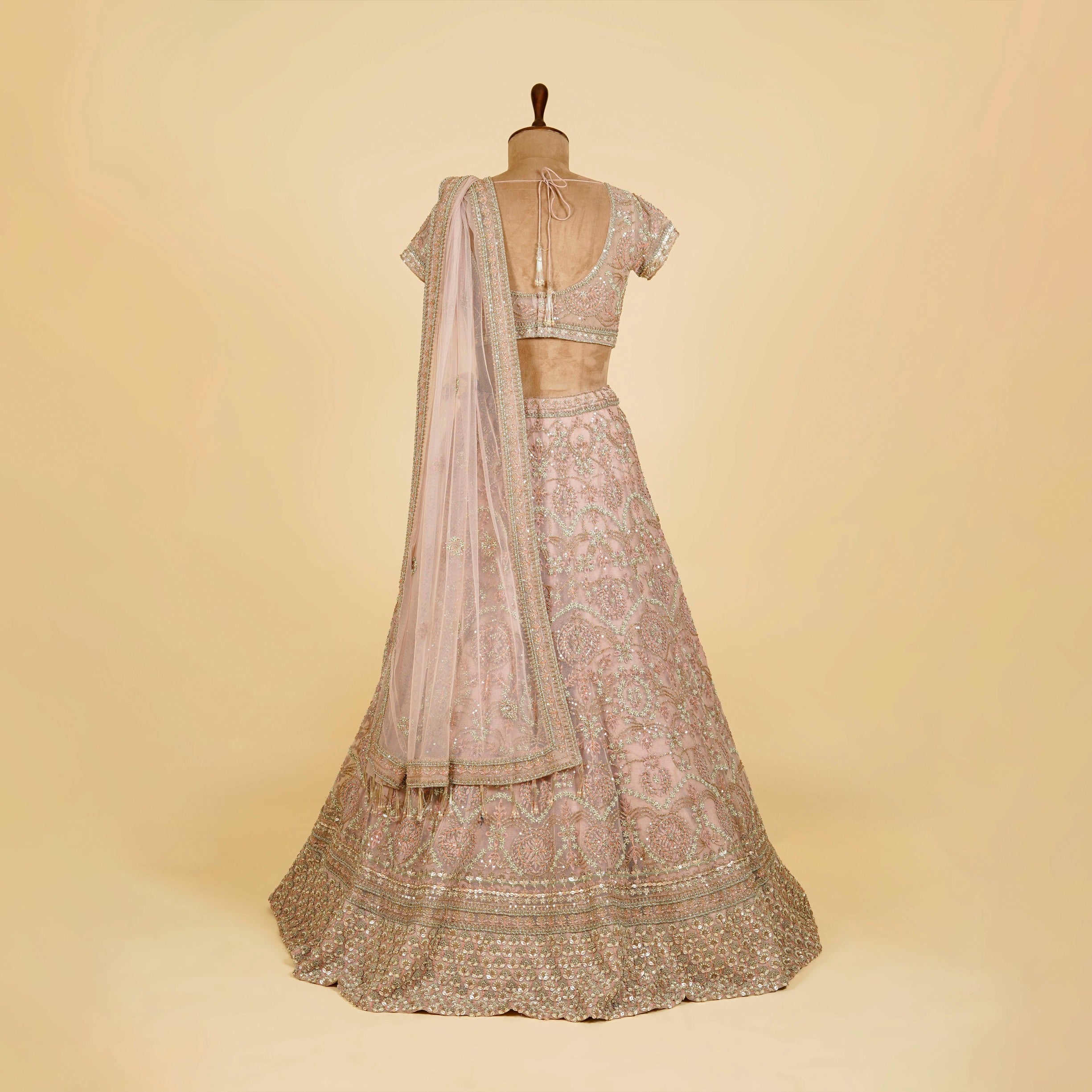 Light Mauve Lehenga Choli embellished with Sequins, Pearls and Cut Dana work