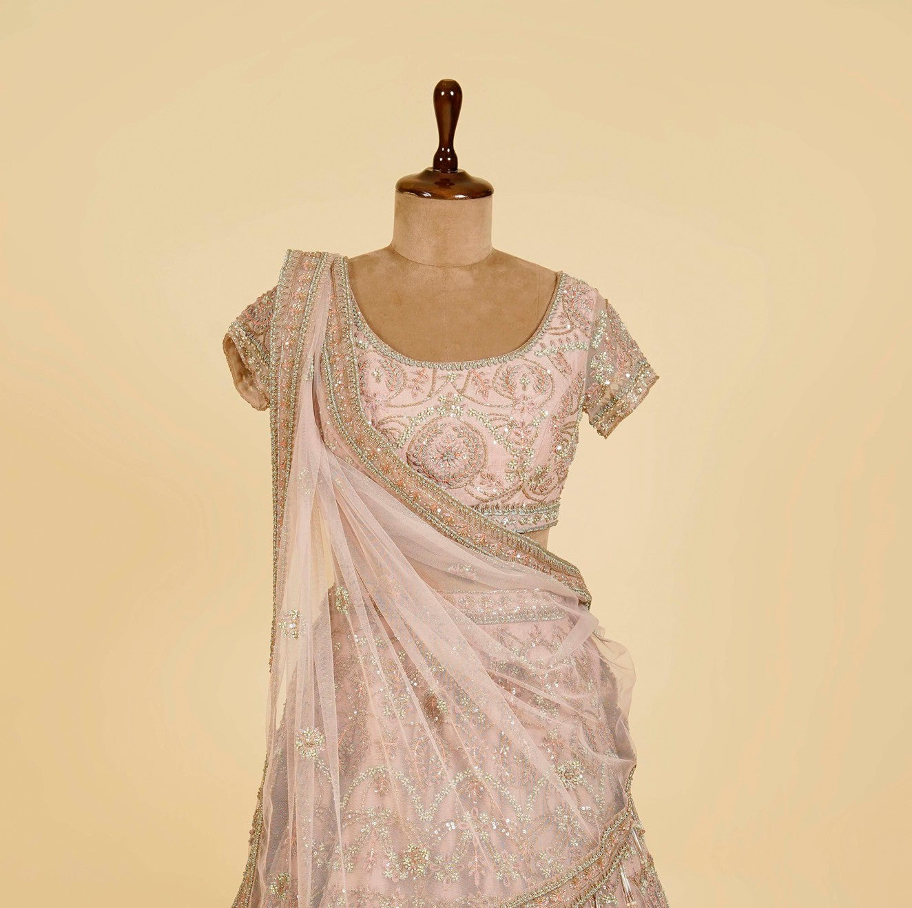 Light Mauve Lehenga Choli embellished with Sequins, Pearls and Cut Dana work
