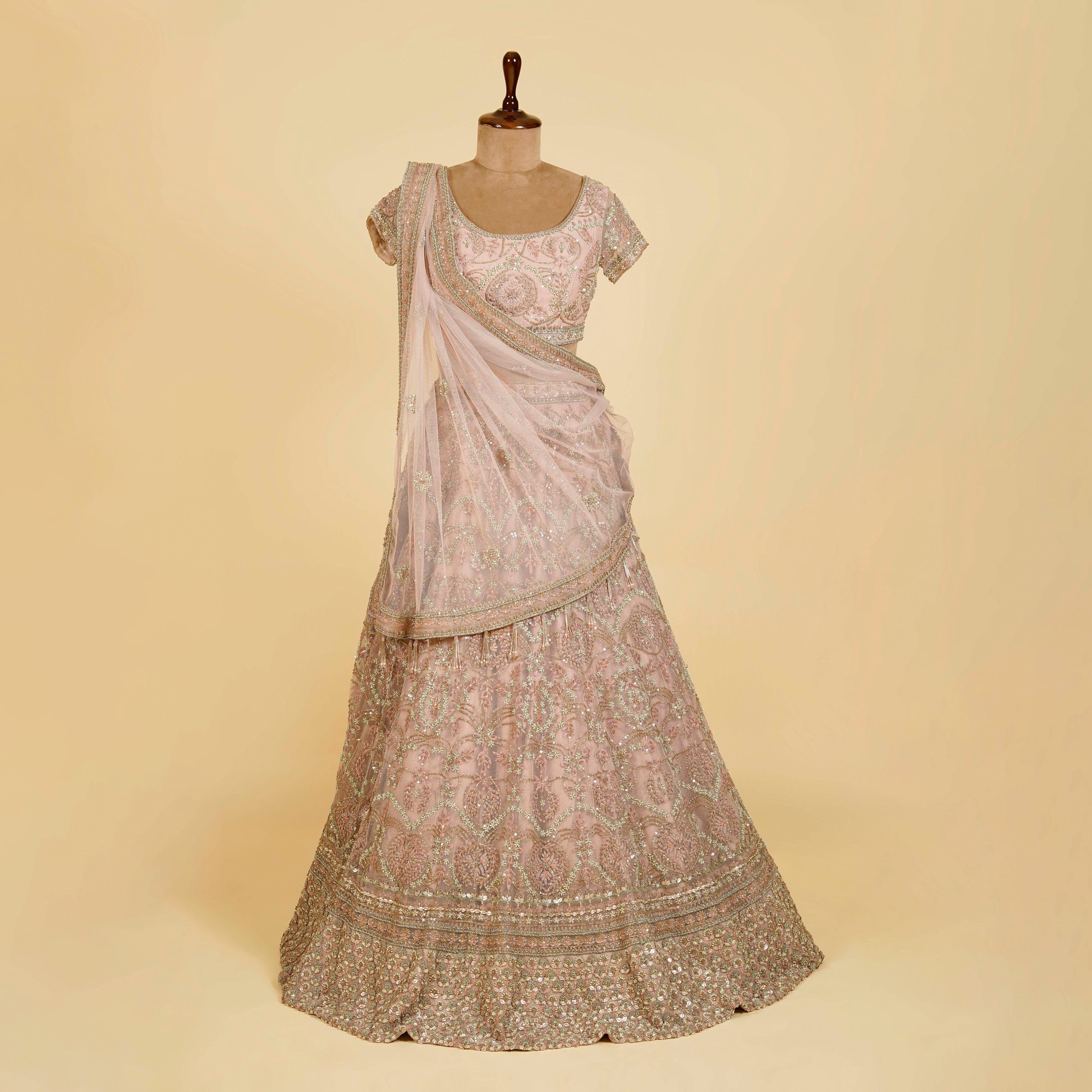 Light Mauve Lehenga Choli embellished with Sequins, Pearls and Cut Dana work