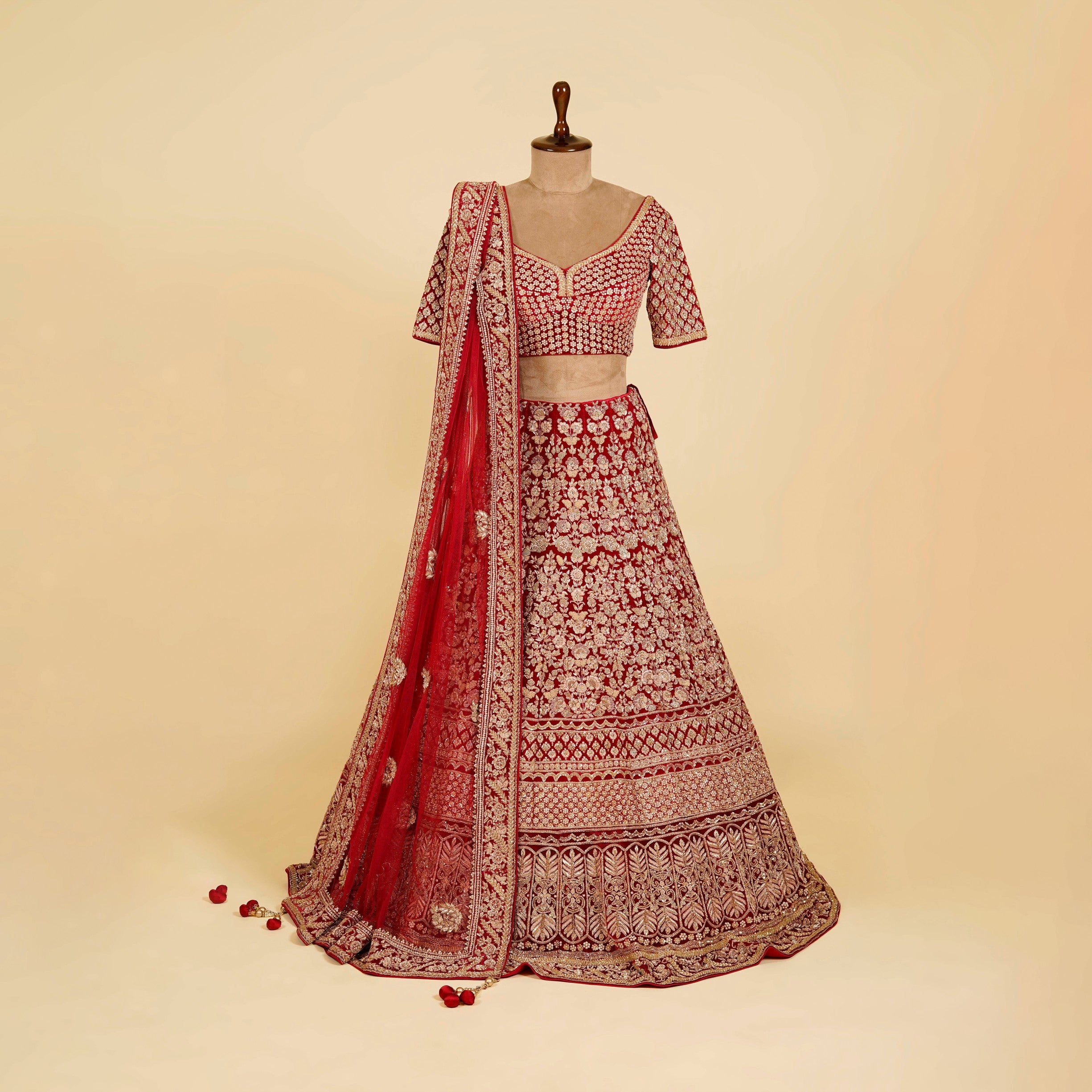 Red Lehenga Choli embellished with Dabka, Pearls and Cut Dana work