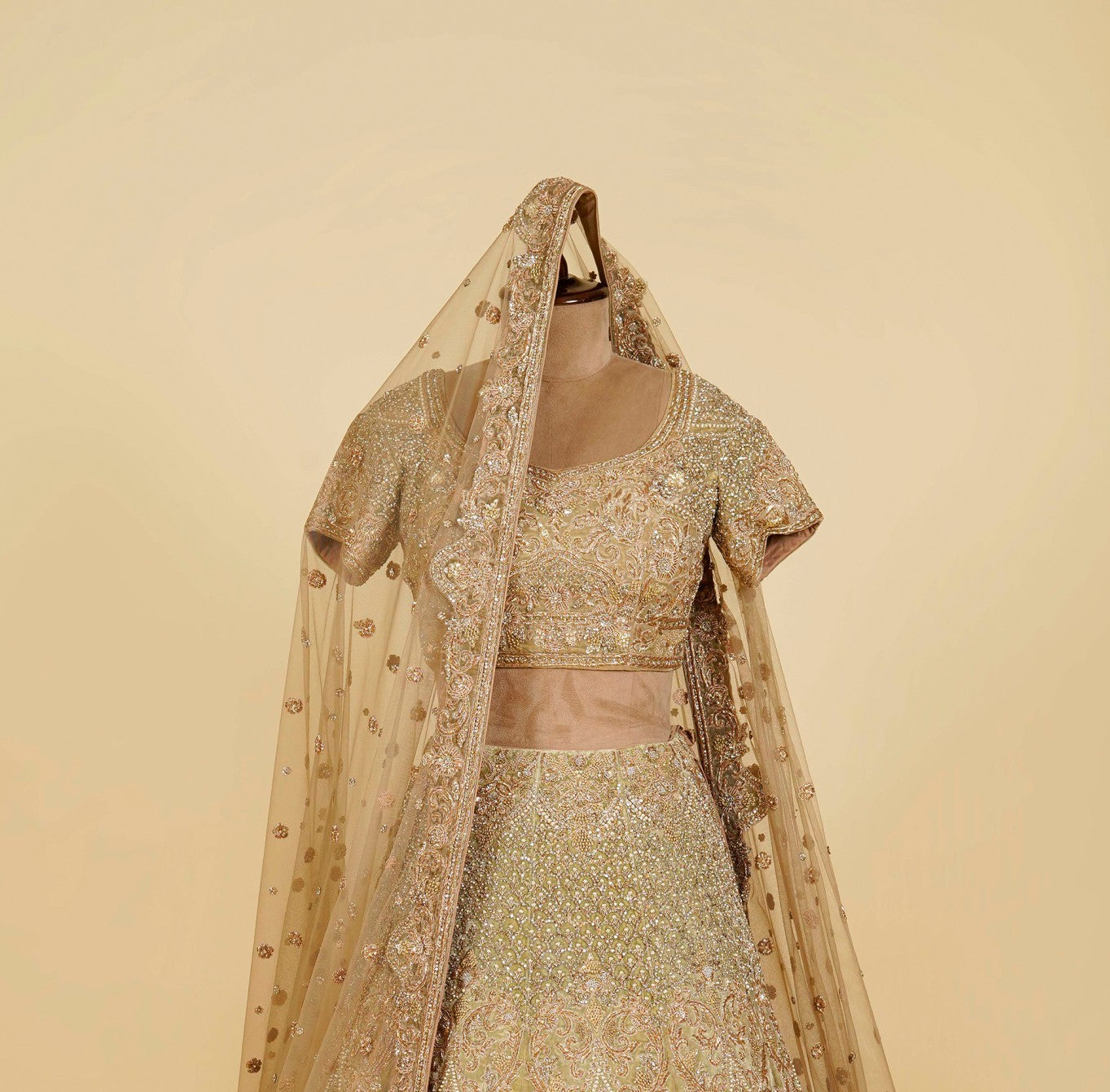 Green Lehenga Choli embellished with Dabka, Pearls and Stone work