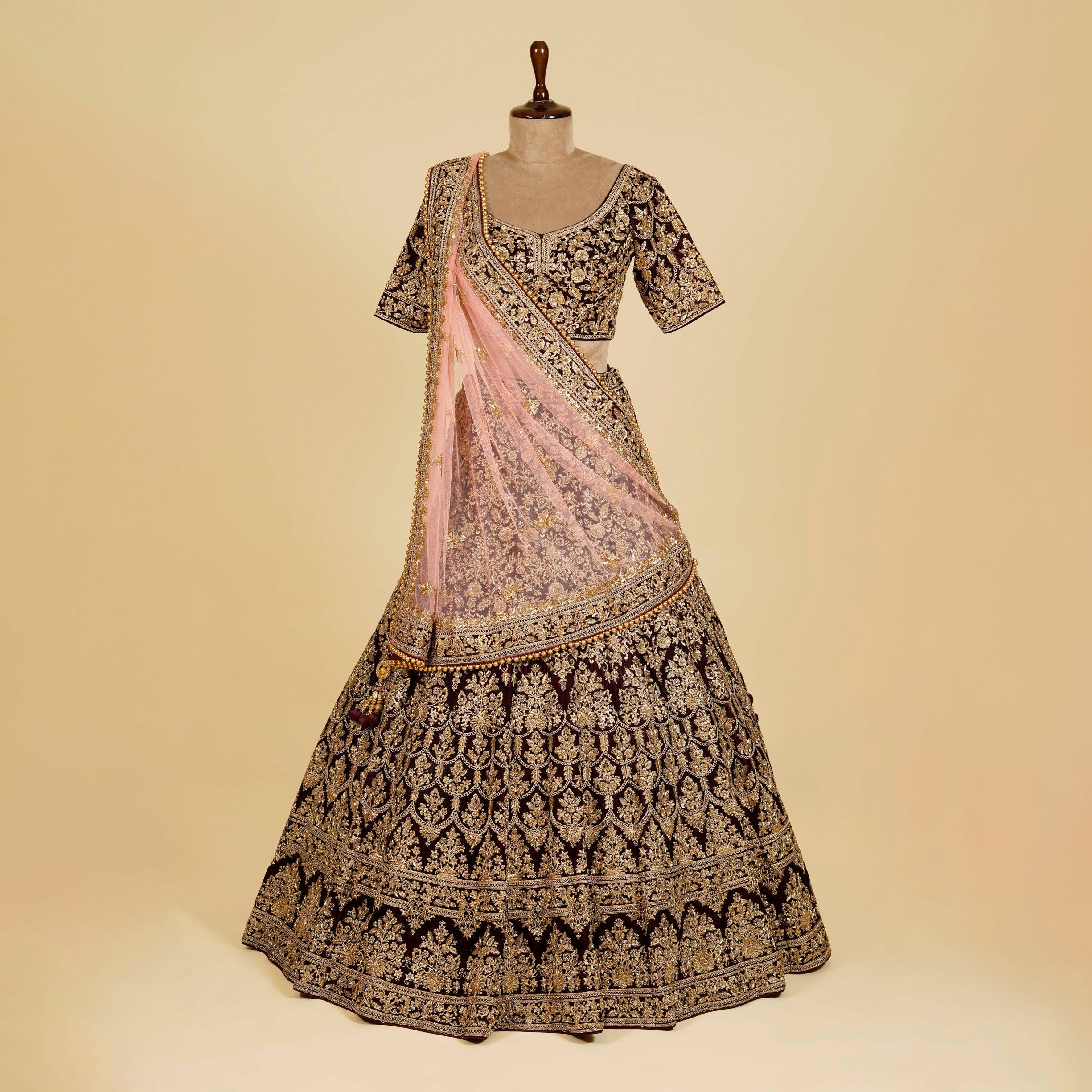 Dark Maroon Wine Lehenga Choli embellished with Dabka, Stone and Gold antique work