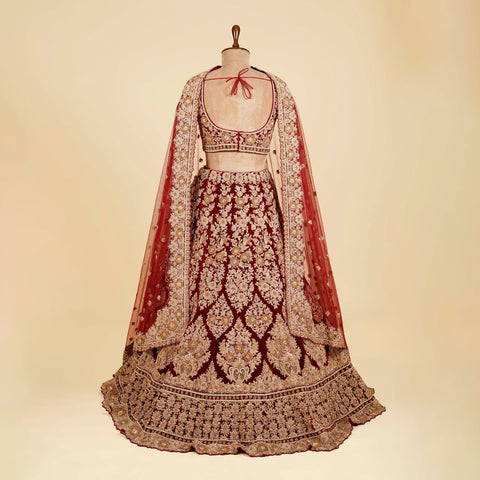 Reddish Maroon Lehenga Choli embellished with Dabka, Stone and antique work