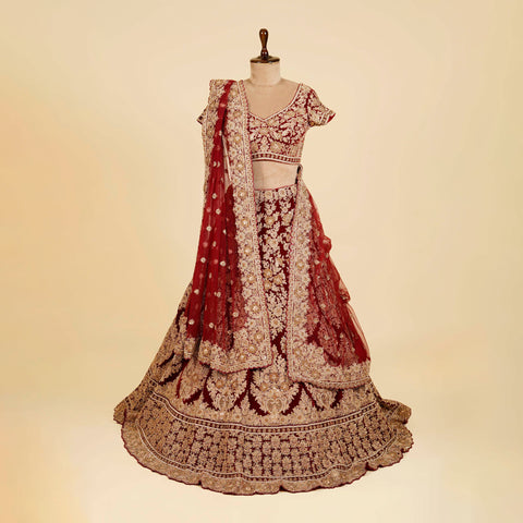 Reddish Maroon Lehenga Choli embellished with Dabka, Stone and antique work