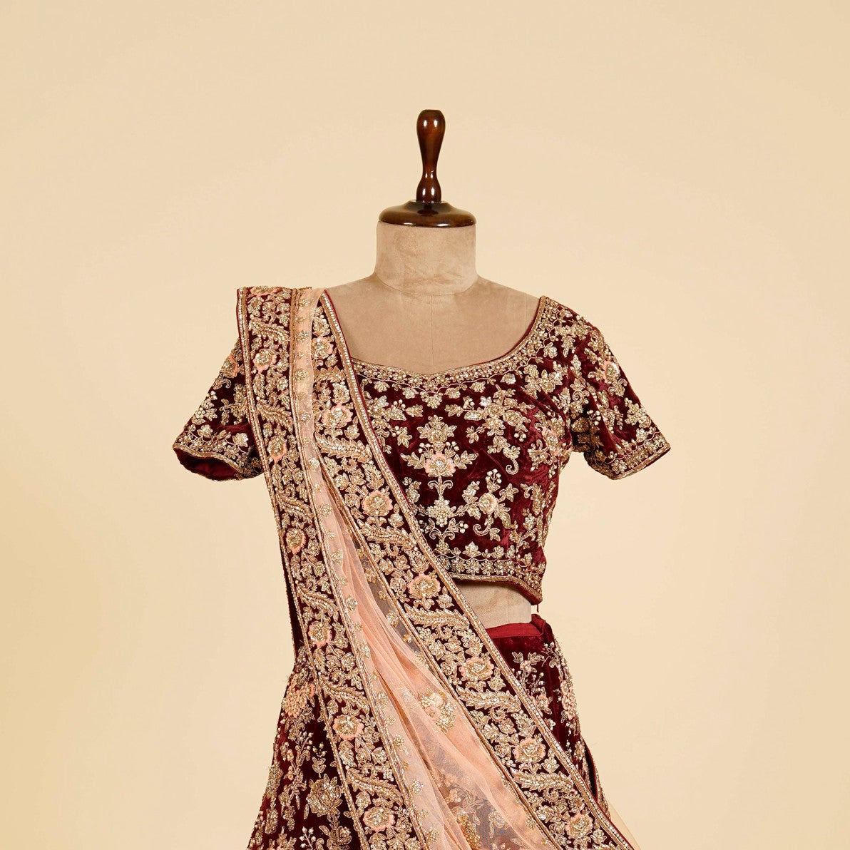 Maroon Lehenga Choli embellished with Dabka, Thread and antique work