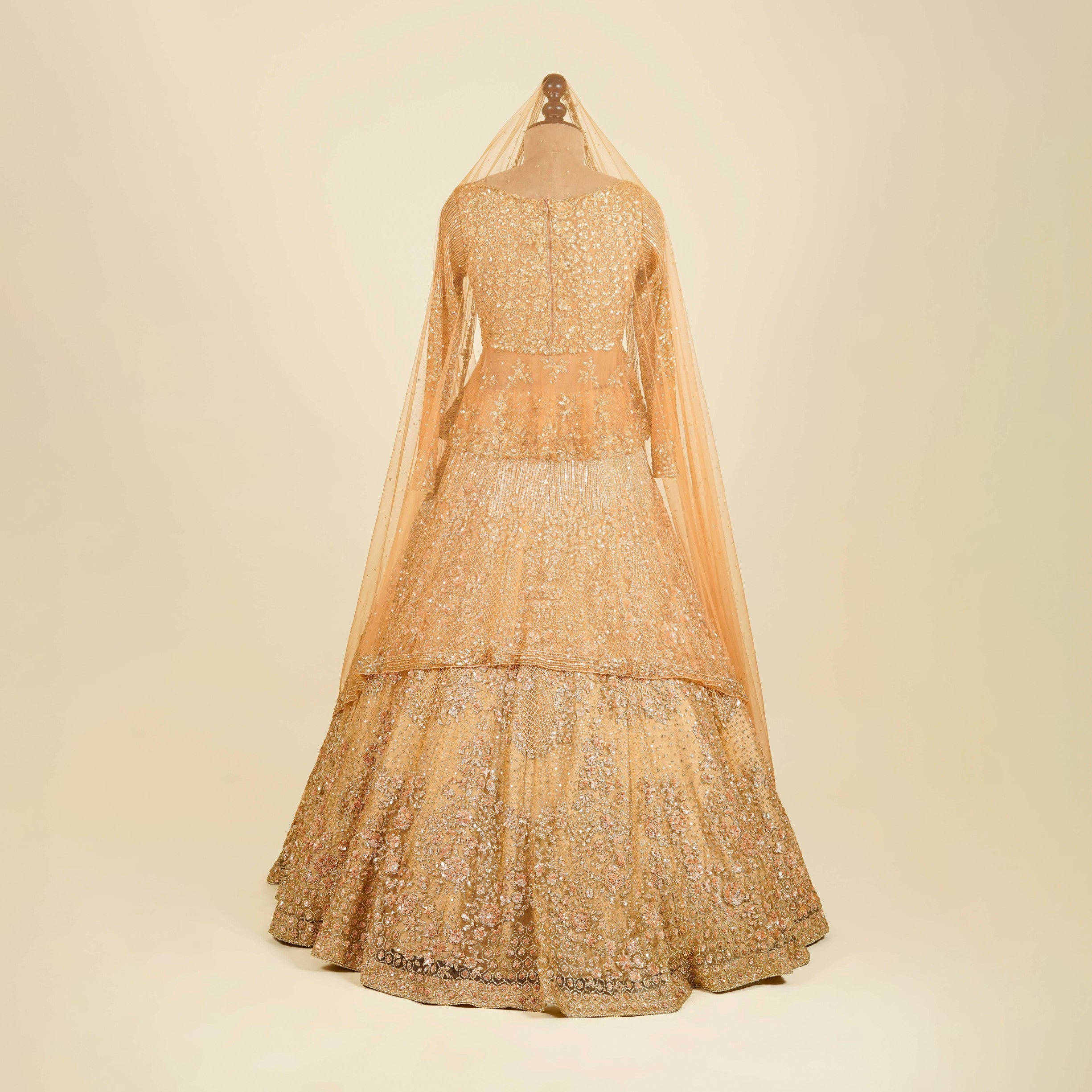 Chiku Gold Lehenga Choli embellished with Sequins, Cut dana and Swarovski work