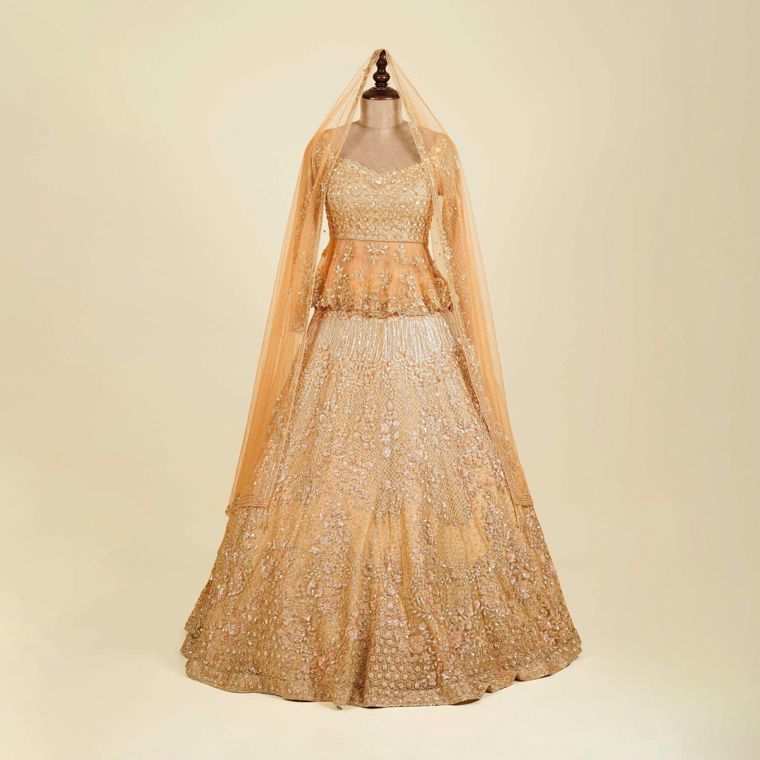 Chiku Gold Lehenga Choli embellished with Sequins, Cut dana and Swarovski work