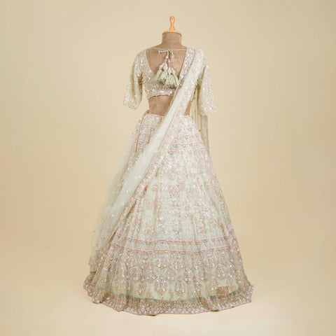 Mint Green Lehenga Choli embellished with Sequins, Cut dana, Kundan and Naqshi work