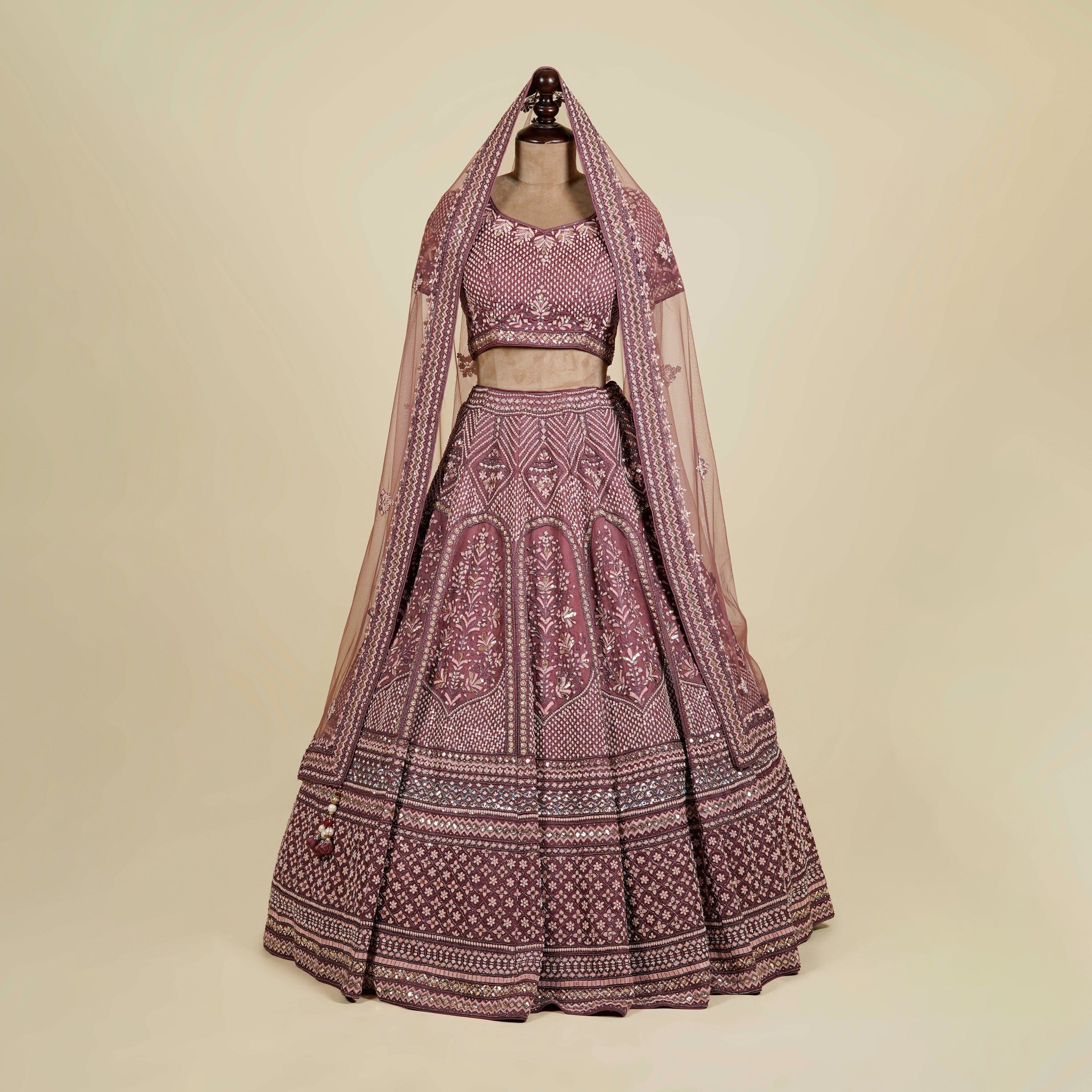 Onion color Lehenga Choli embellished with Zardosi, Dabka and Mukaish work