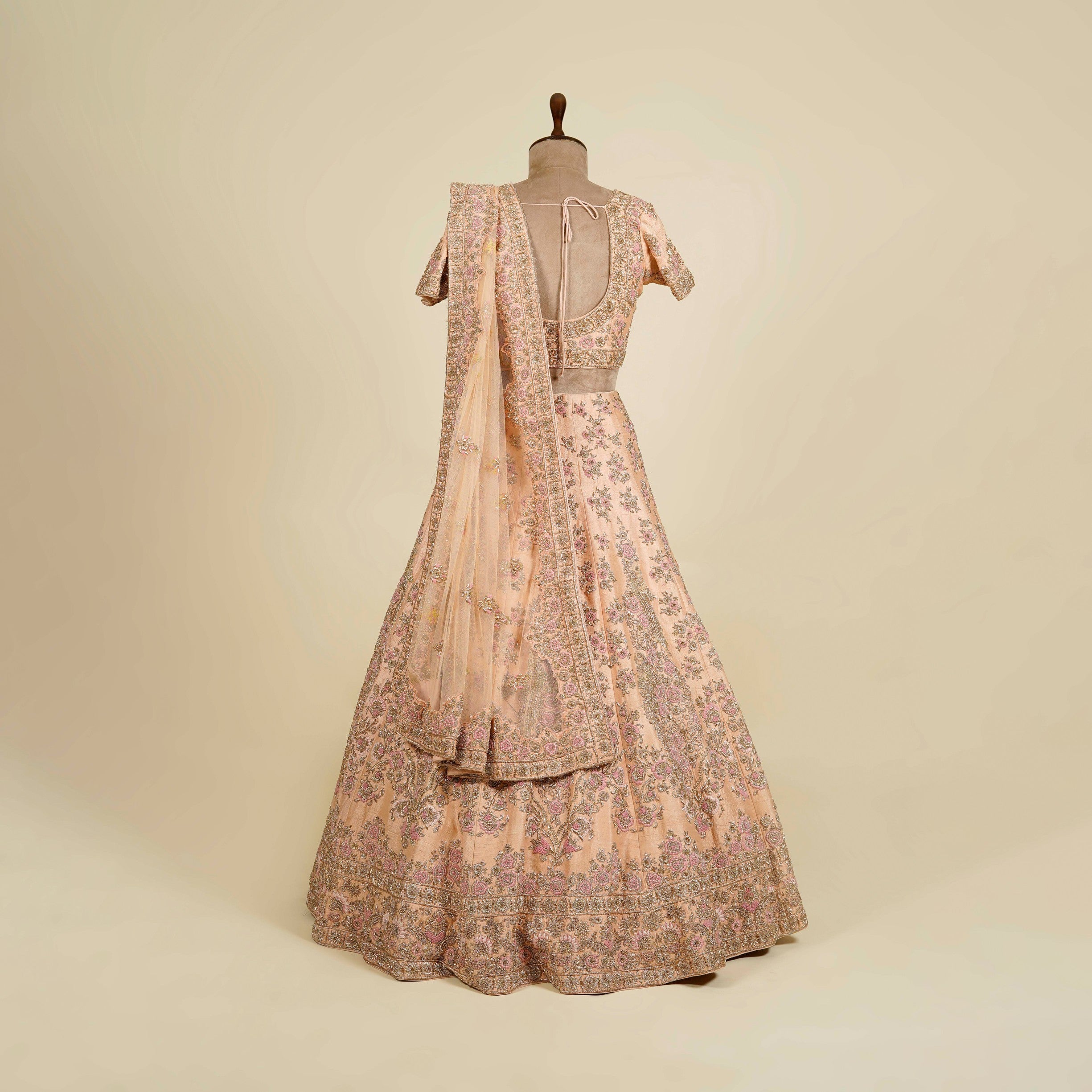 Peach Lehenga Choli embellished with Zardosi, Stone and Thread work