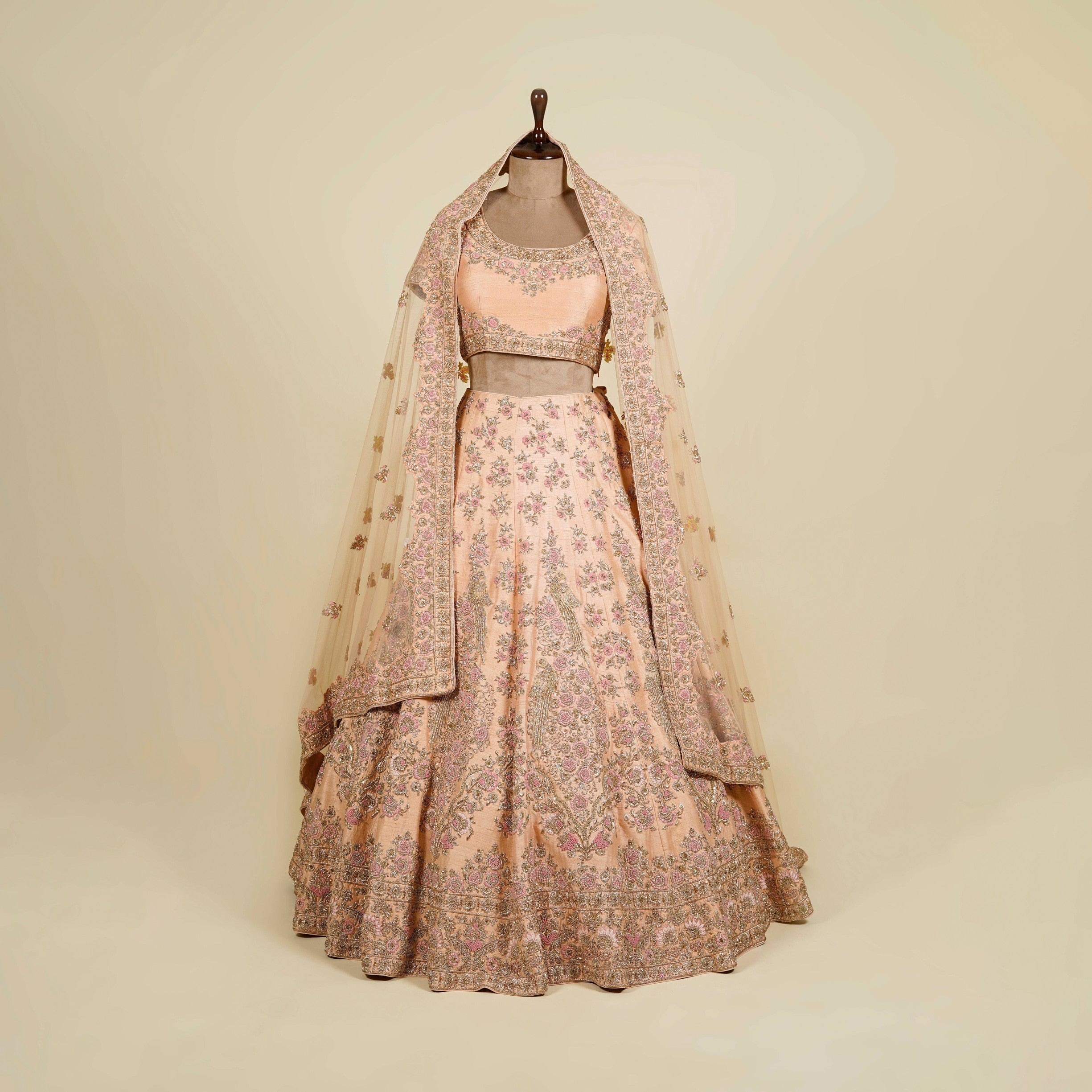 Peach Lehenga Choli embellished with Zardosi, Stone and Thread work