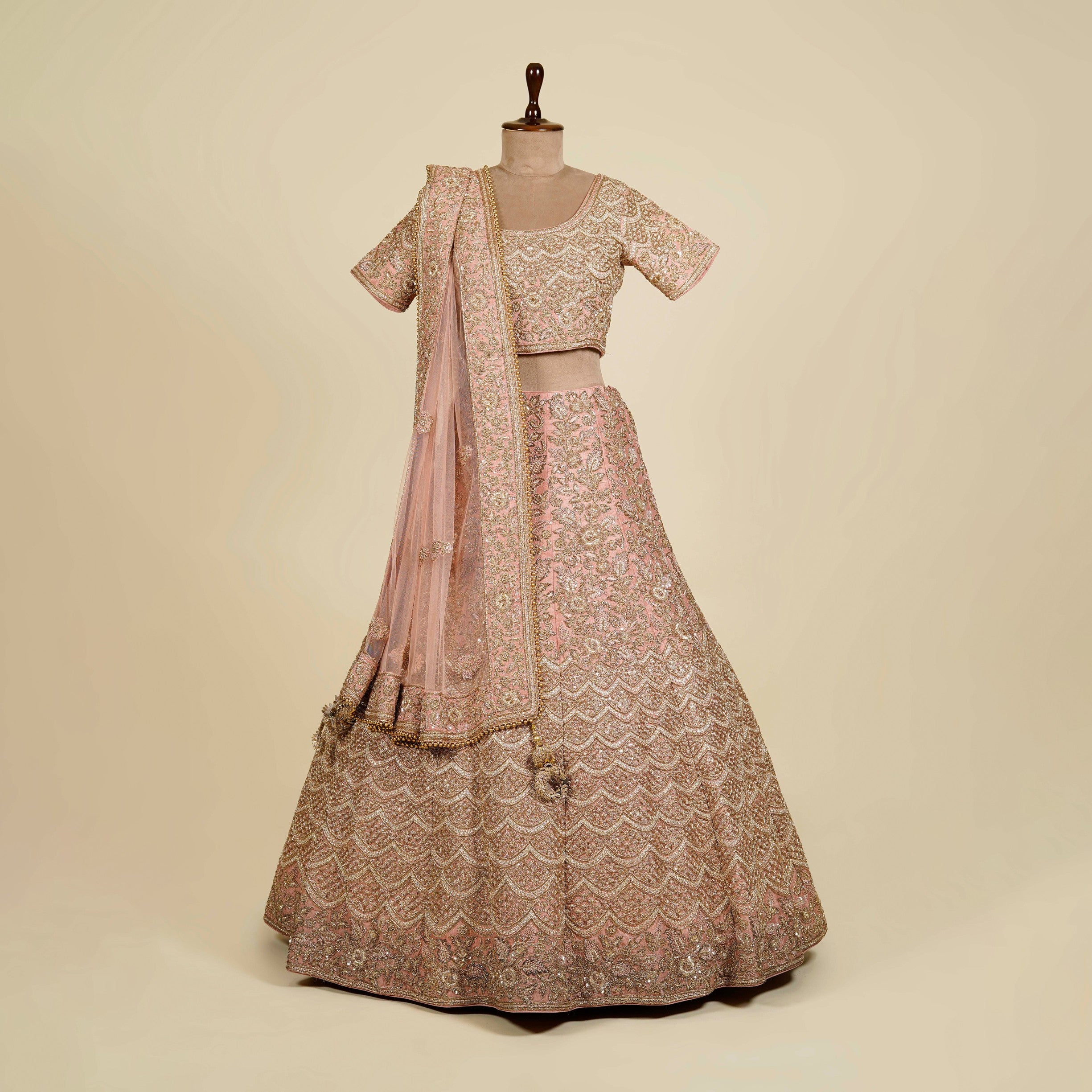 Pink Lehenga Choli embellished with Zardosi, Stone and Knot work