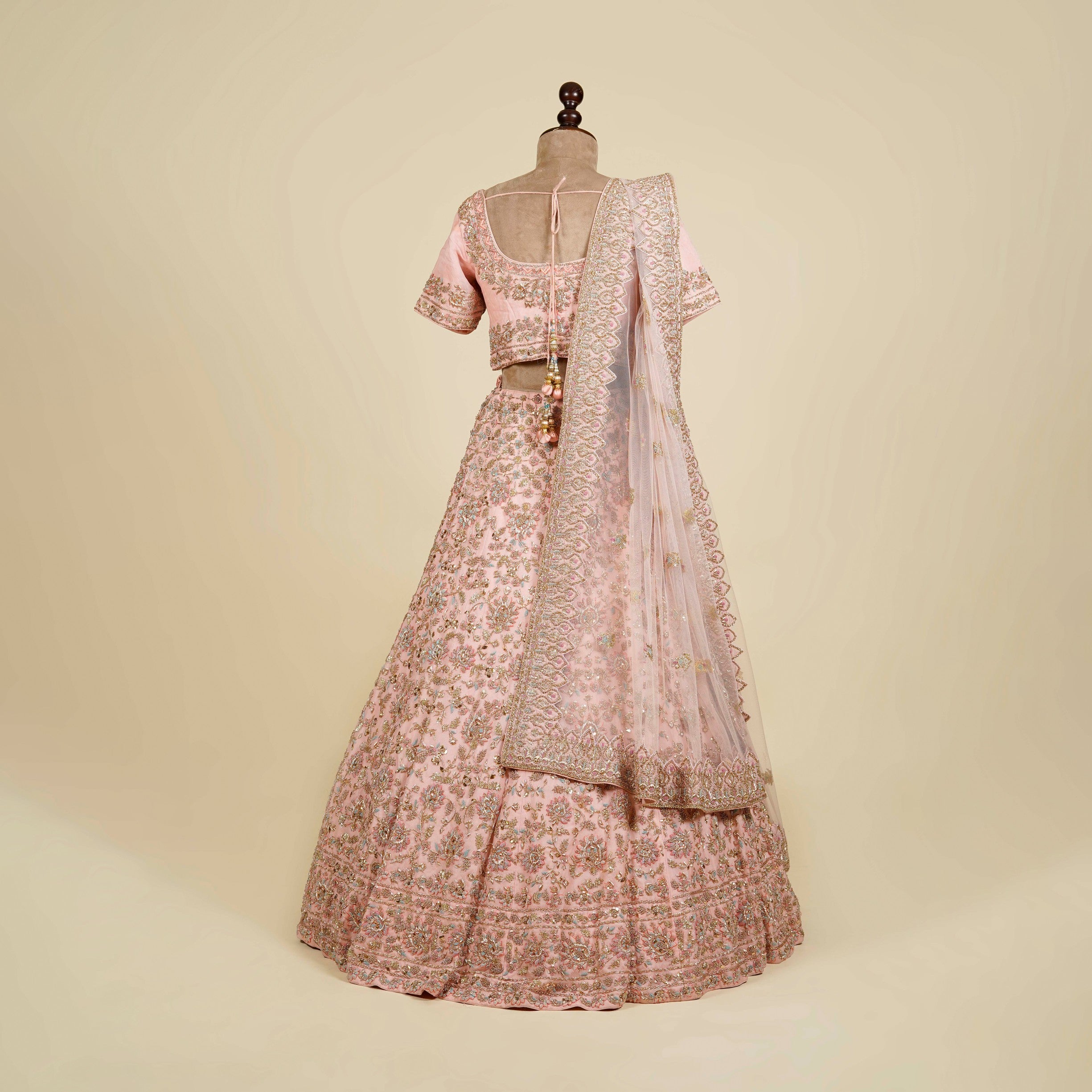 Powder Pink Lehenga Choli embellished with Zardosi and Mukaish work