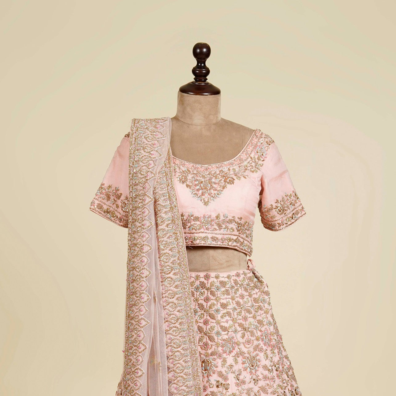 Powder Pink Lehenga Choli embellished with Zardosi and Mukaish work