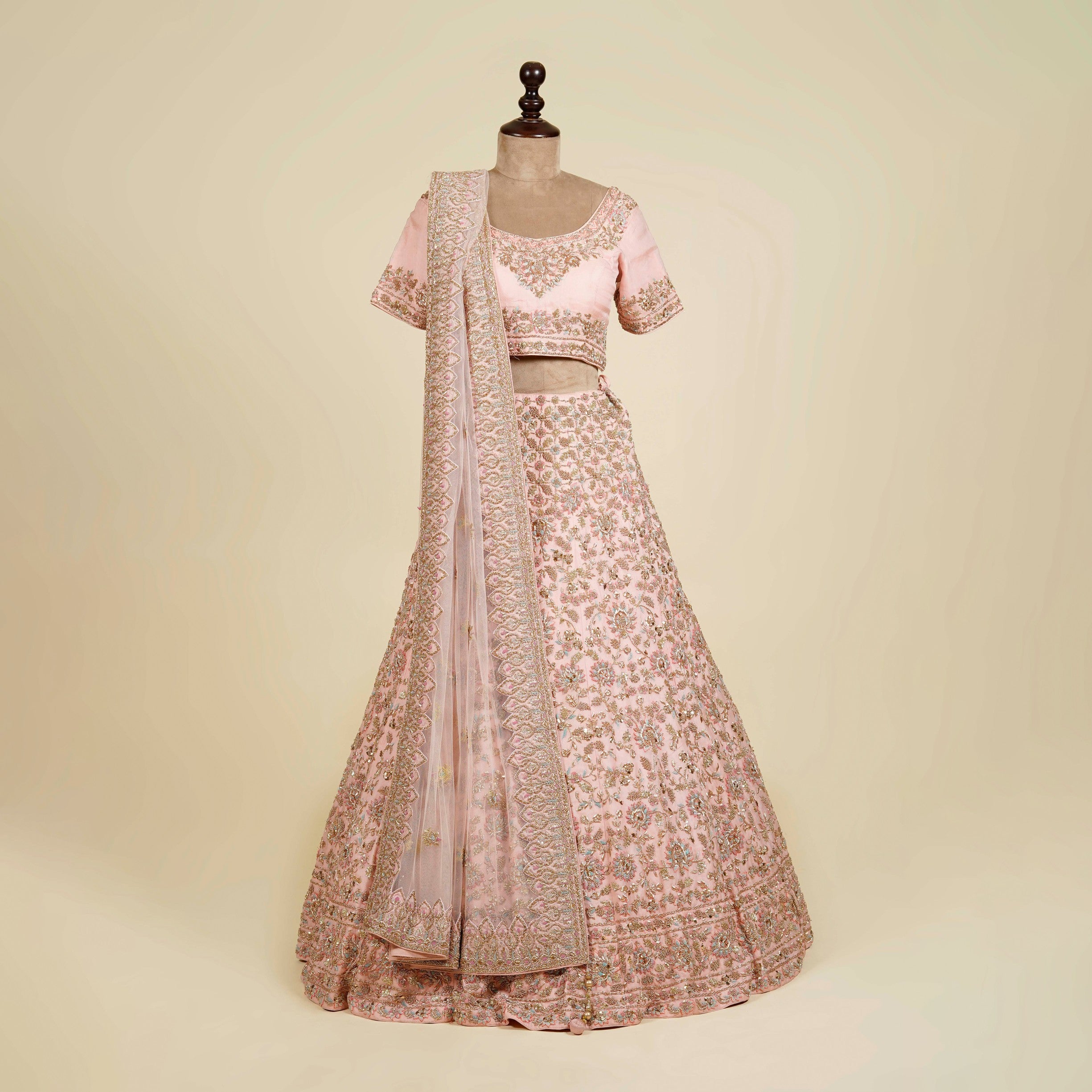 Powder Pink Lehenga Choli embellished with Zardosi and Mukaish work