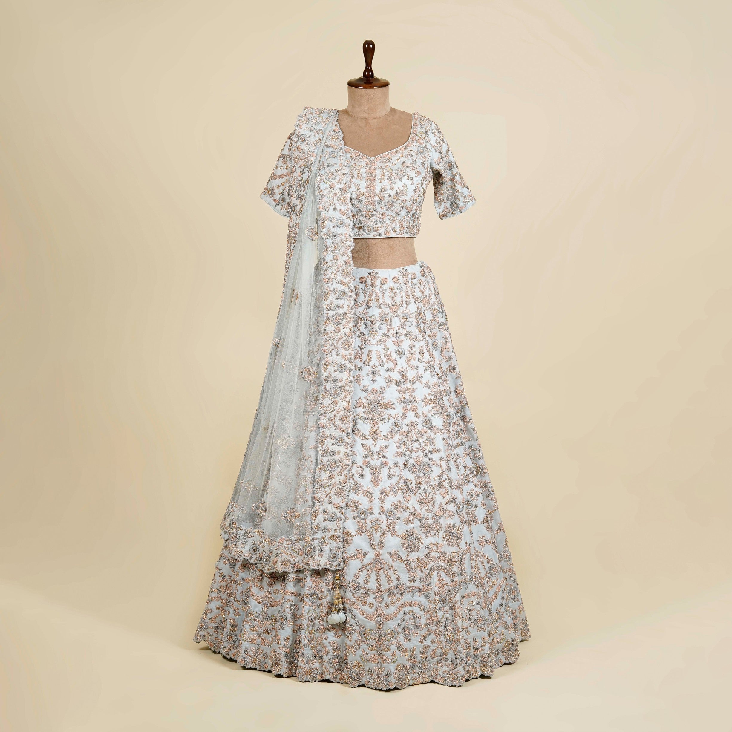 Sky Blue Lehenga Choli embellished with Zardosi, Thread and Knot work