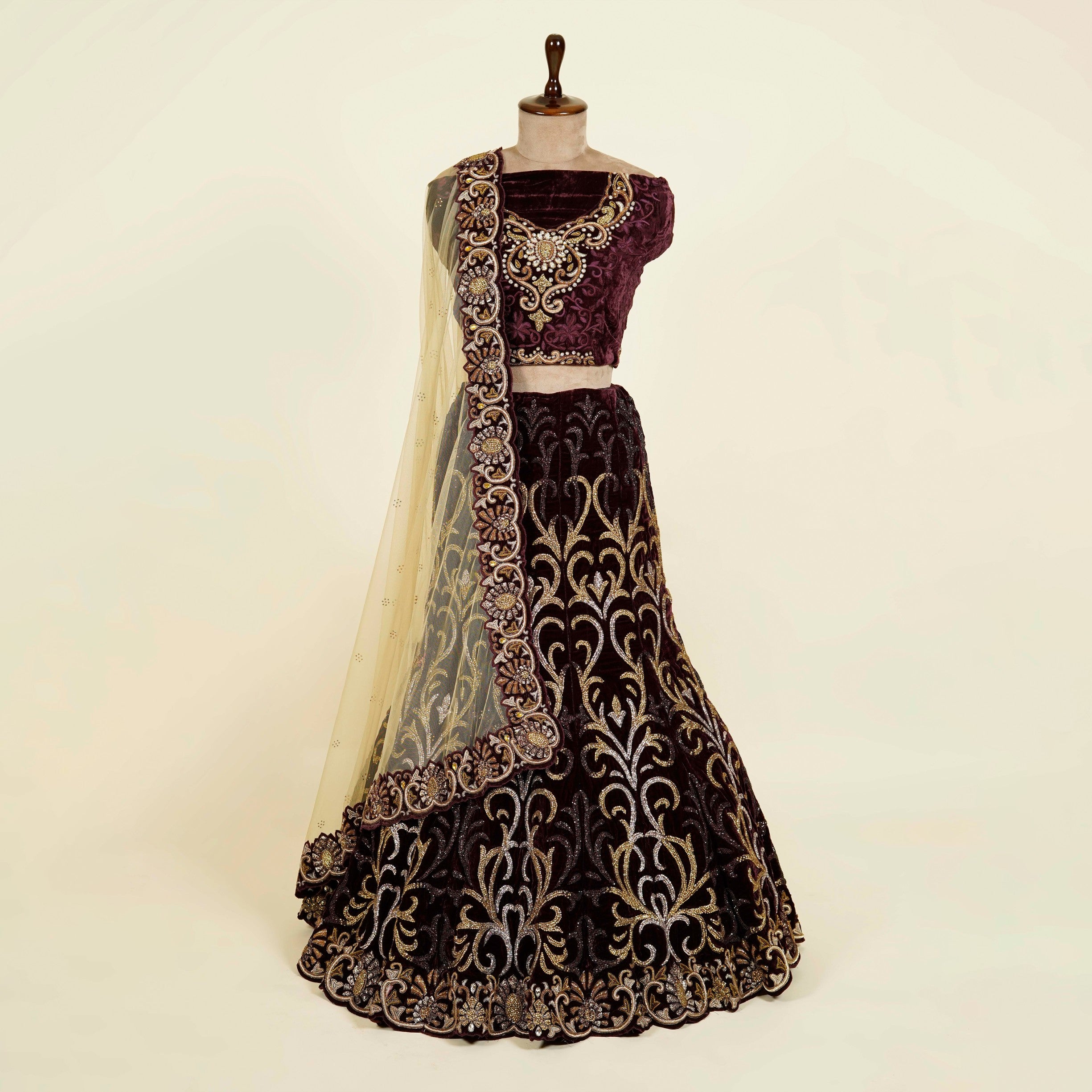 Wine Lehenga Choli embellished with Swarovski and Thread work