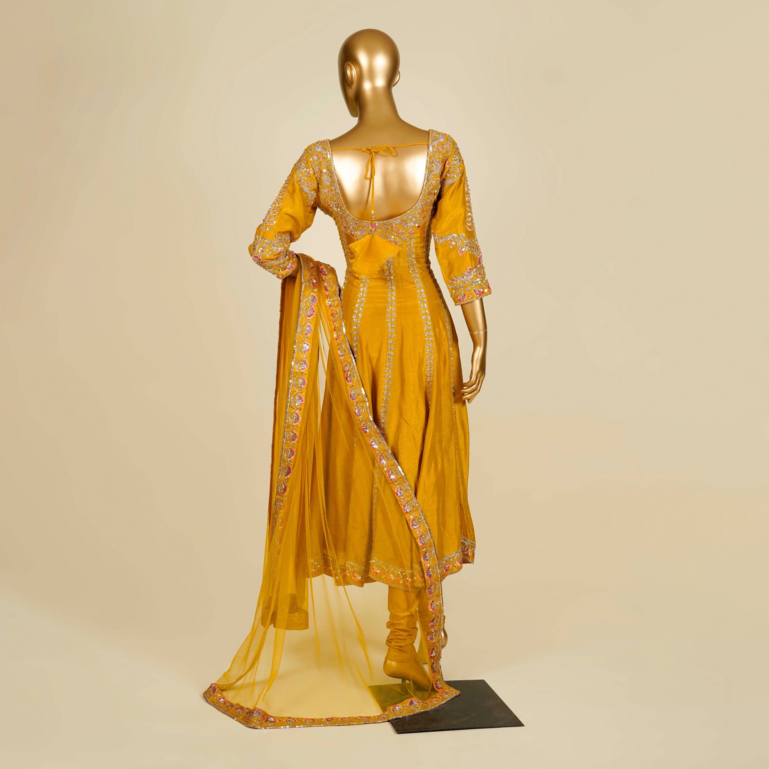 Mustard Anarkali embellished with Zardosi, Thread and Sequins work