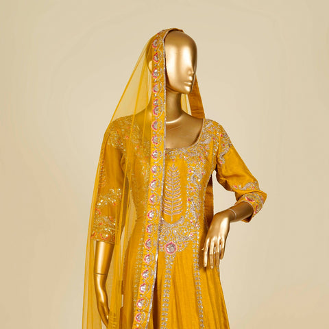 Mustard Anarkali embellished with Zardosi, Thread and Sequins work