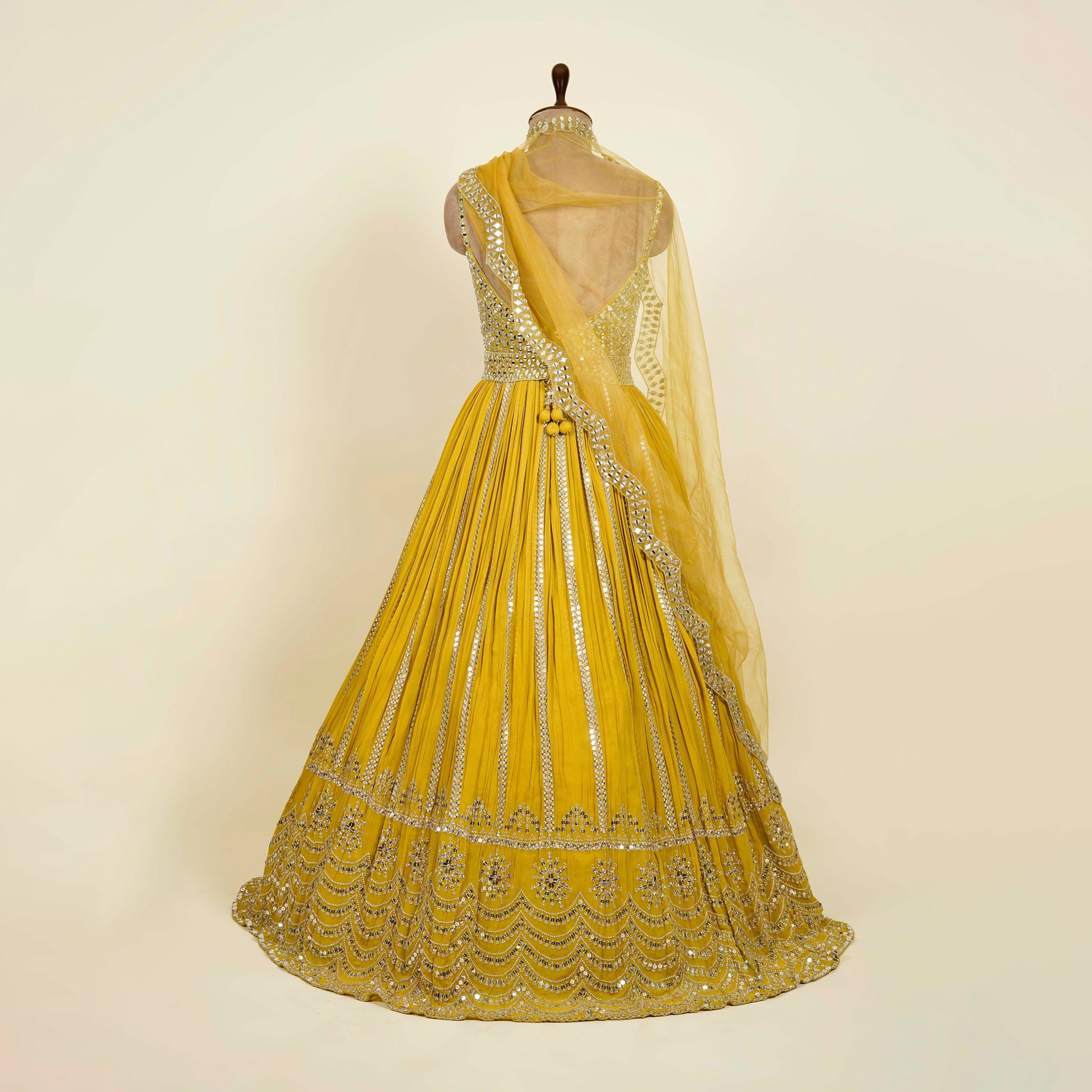 Mustard Anarkali with belt embellished with Mirror and Sequins work