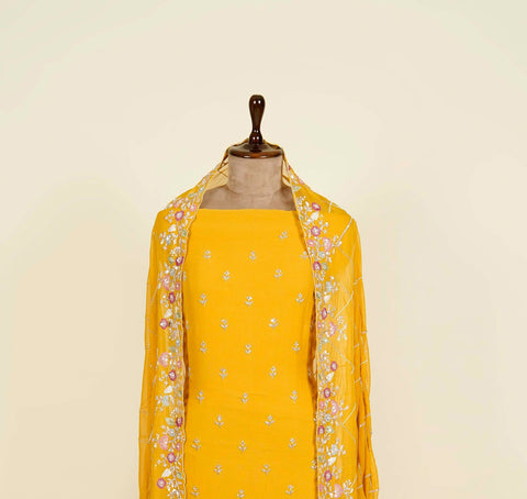 Mustard Unstitched suit embellished with Thread, Sequins and Cut dana work