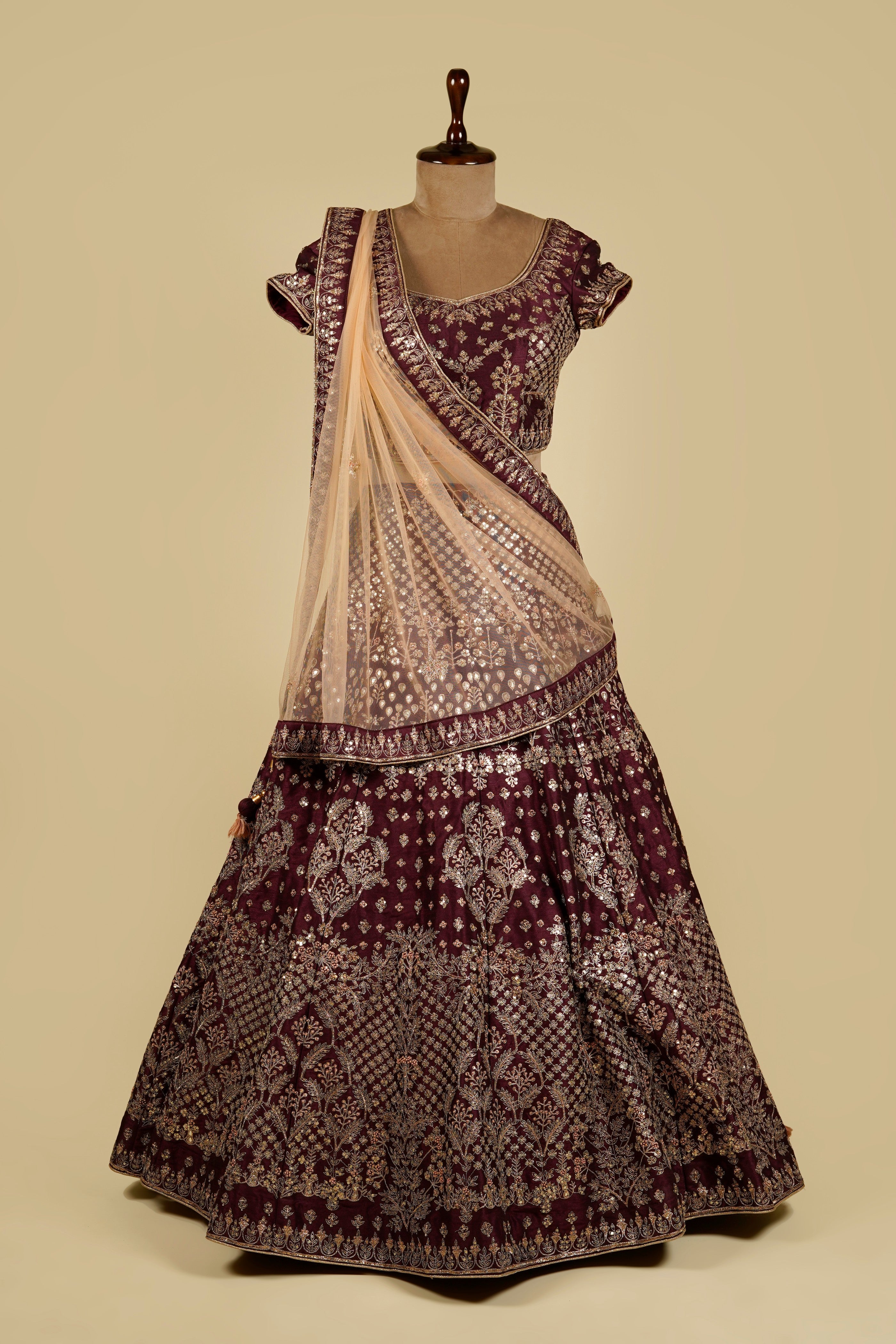 Wine Maroon Lehenga Choli embellished with Zardozi, Dota patti and Dori work