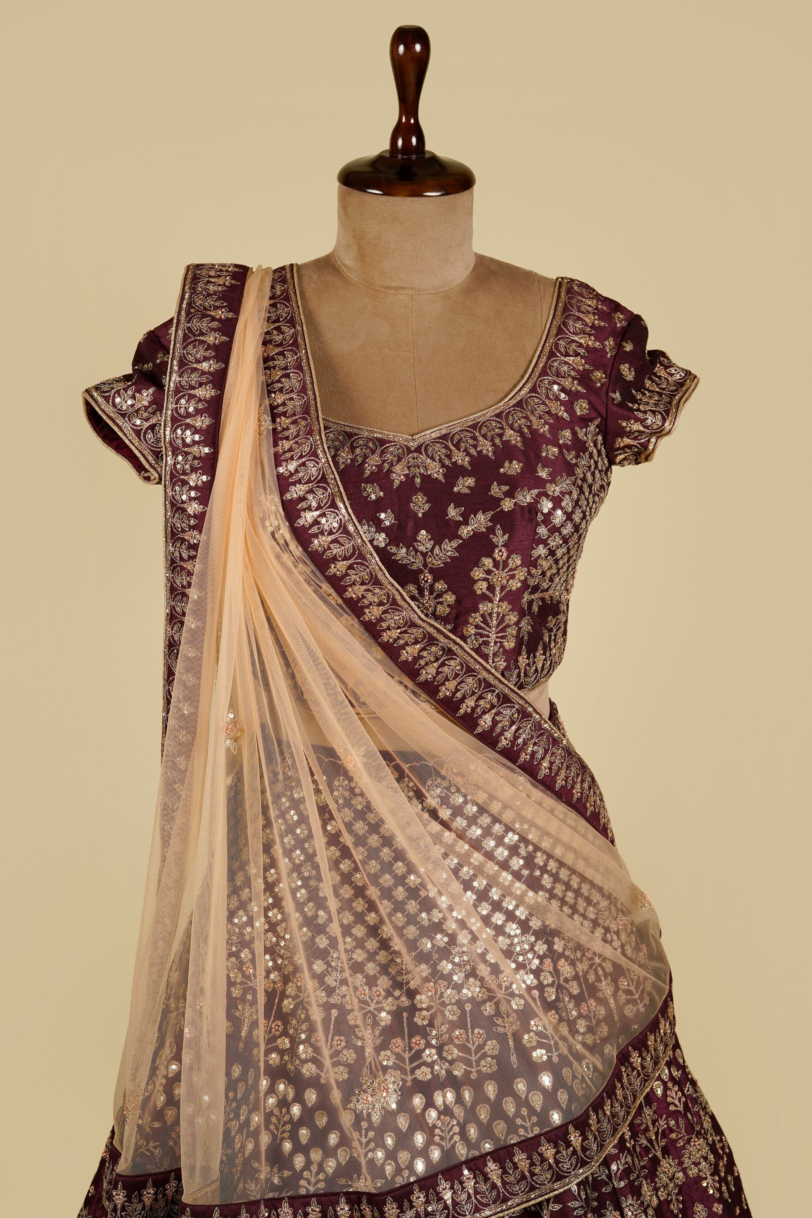 Wine Maroon Lehenga Choli embellished with Zardozi, Dota patti and Dori work