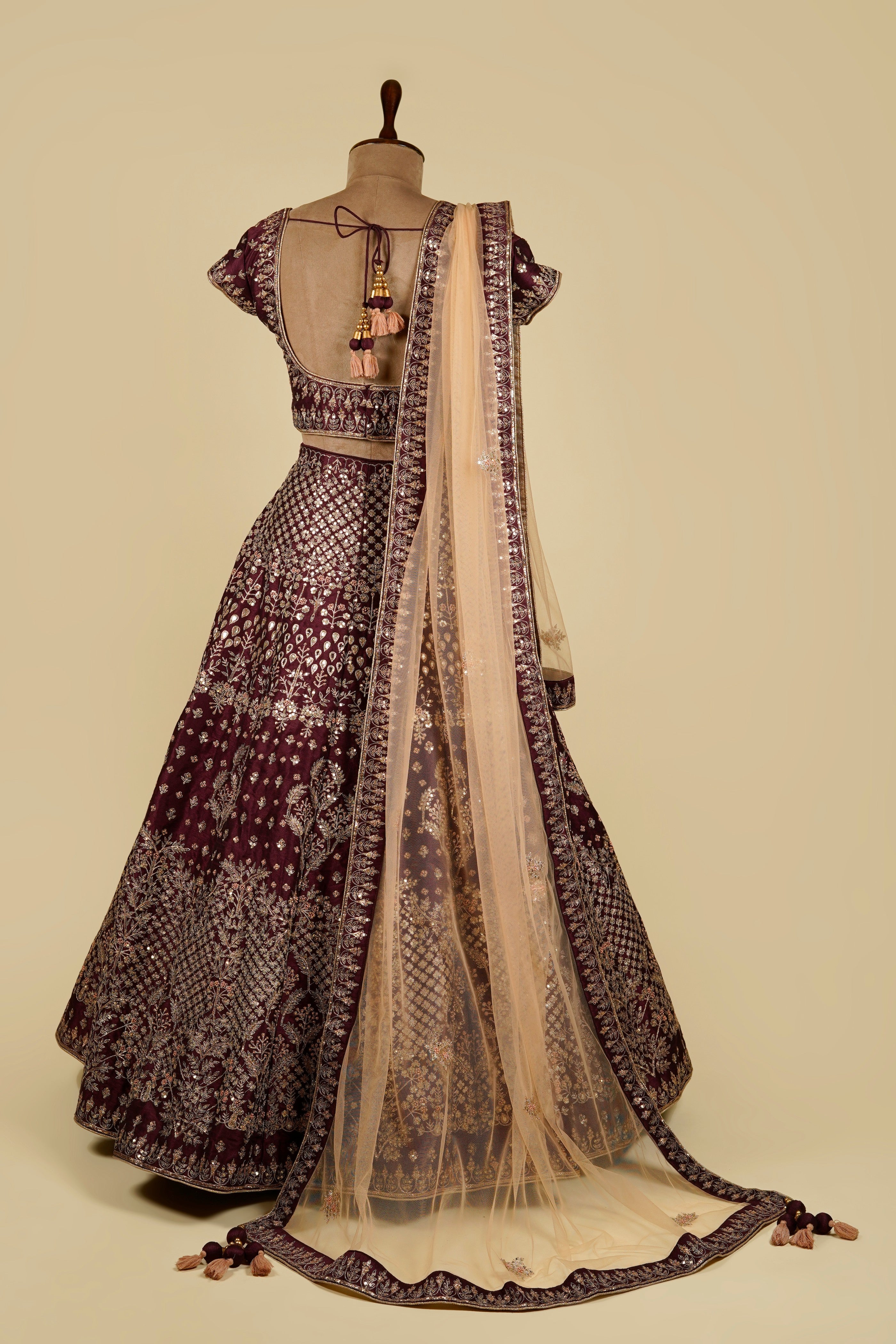 Wine Maroon Lehenga Choli embellished with Zardozi, Dota patti and Dori work